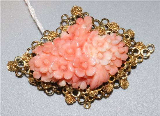 Gold and coral brooch